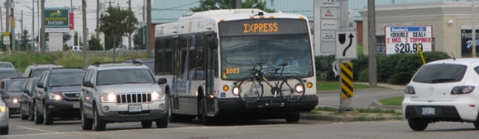 IXpress bus driving in urban area